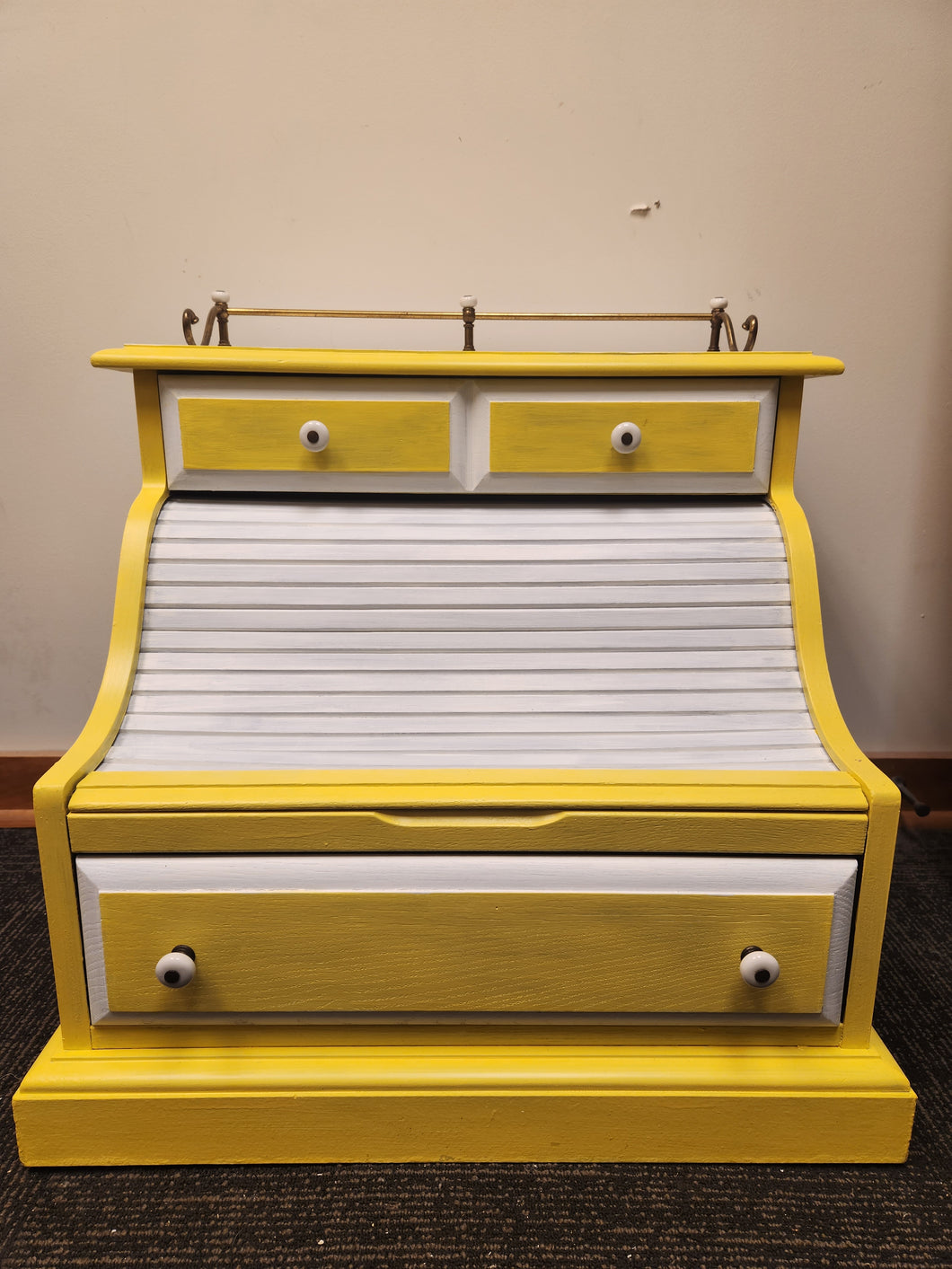Yellow and White Wooden Roll Top